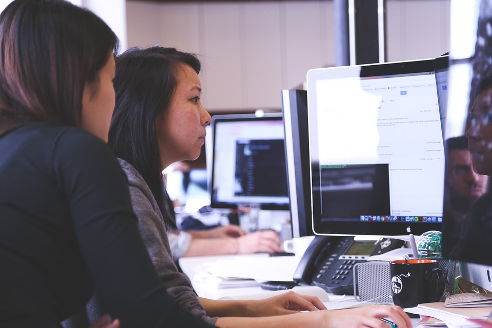 women looking at the computer